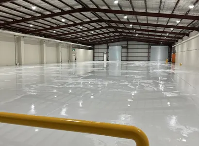 Epoxy vs. Sealed Concrete: Choosing a Warehouse Floor Coating