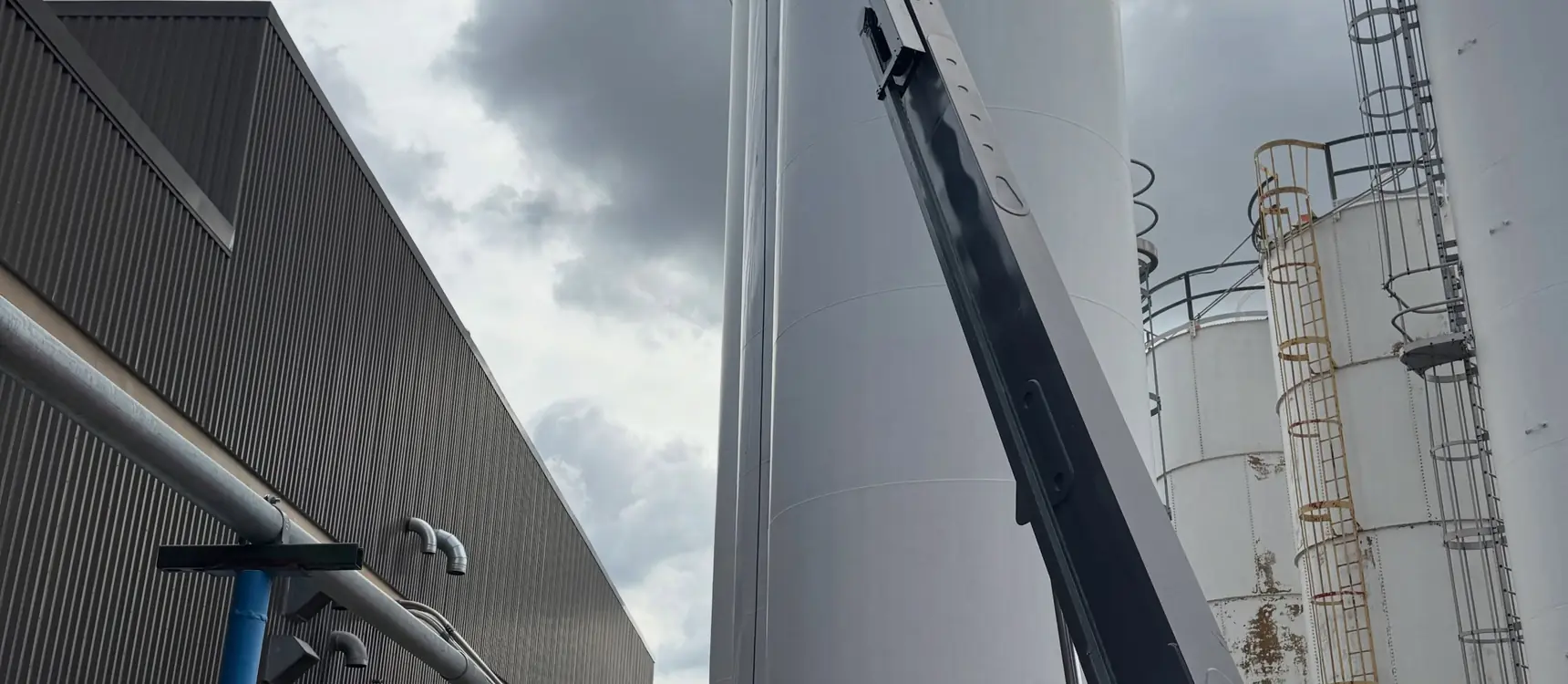Industrial silo coating from a boom lift