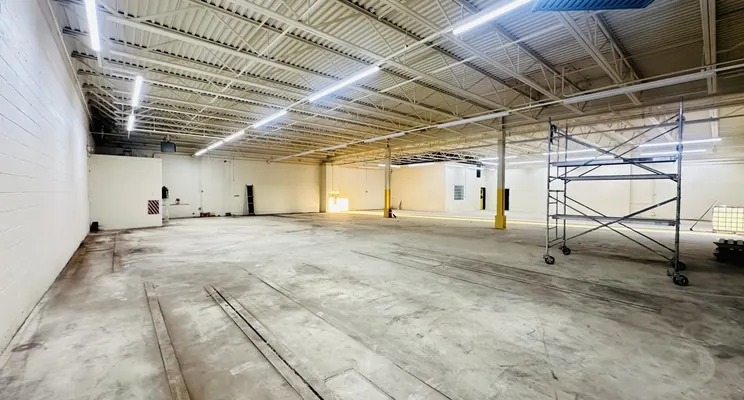 Scaffolding set up for warehouse wall painting